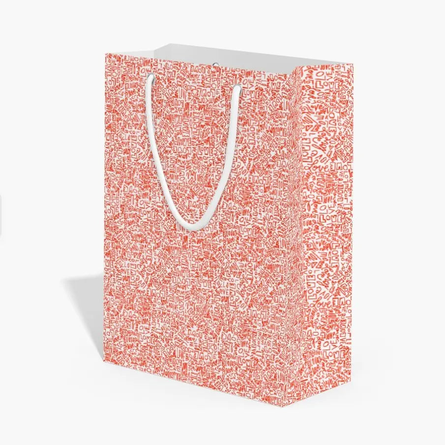 Gift bag with repeating red “LOVE” text in various orientations