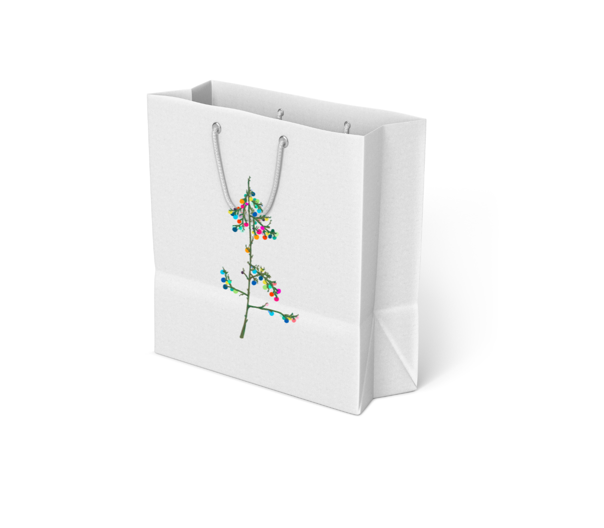 White gift bag with gray rope handles featuring an illustration of a tree branch decorated with colorful round ornaments