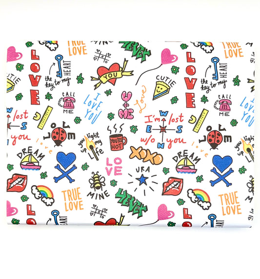 Colorful wrapping paper with love-themed doodles (hearts, flowers) and text phrases "love you" and "true love"