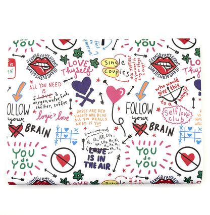 Colorful wrapping paper with playful design featuring hearts, words, and symbols of love and self-care.