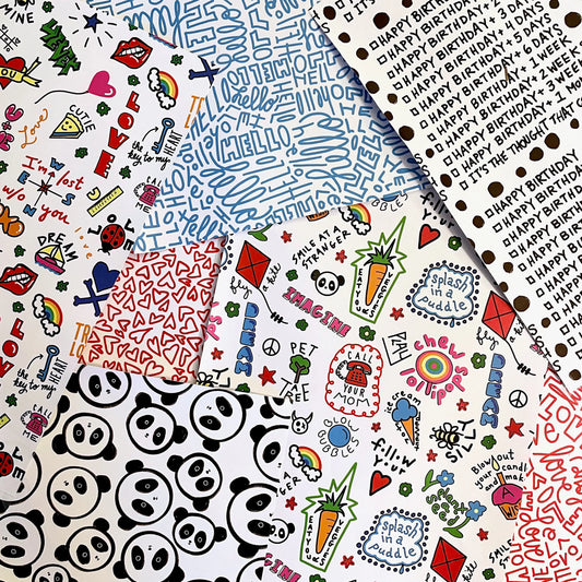 Collection of various patterned paper sheets with different designs.